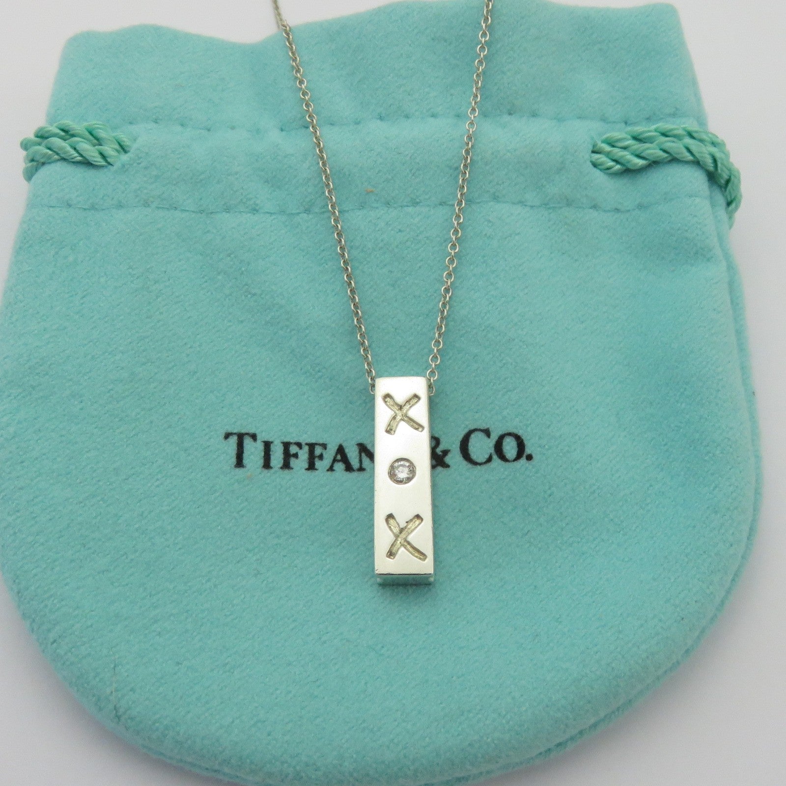 TIFFANY & CO 925 Sterling Silver Diamond Kiss Bar Pendant Necklace with Pouch