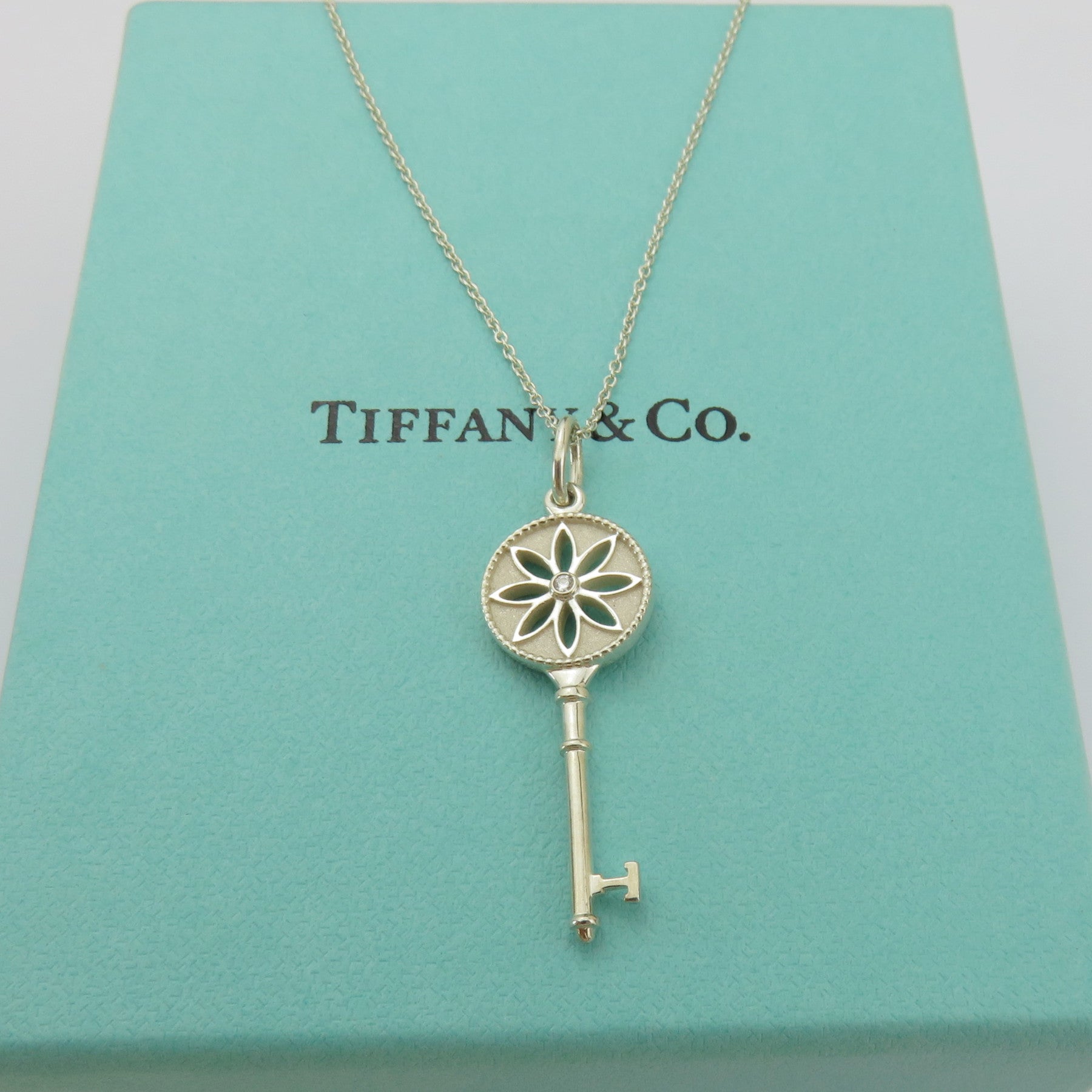 TIFFANY & CO 925 Silver Daisy Flower Key Diamond Necklace with Pouch Box
