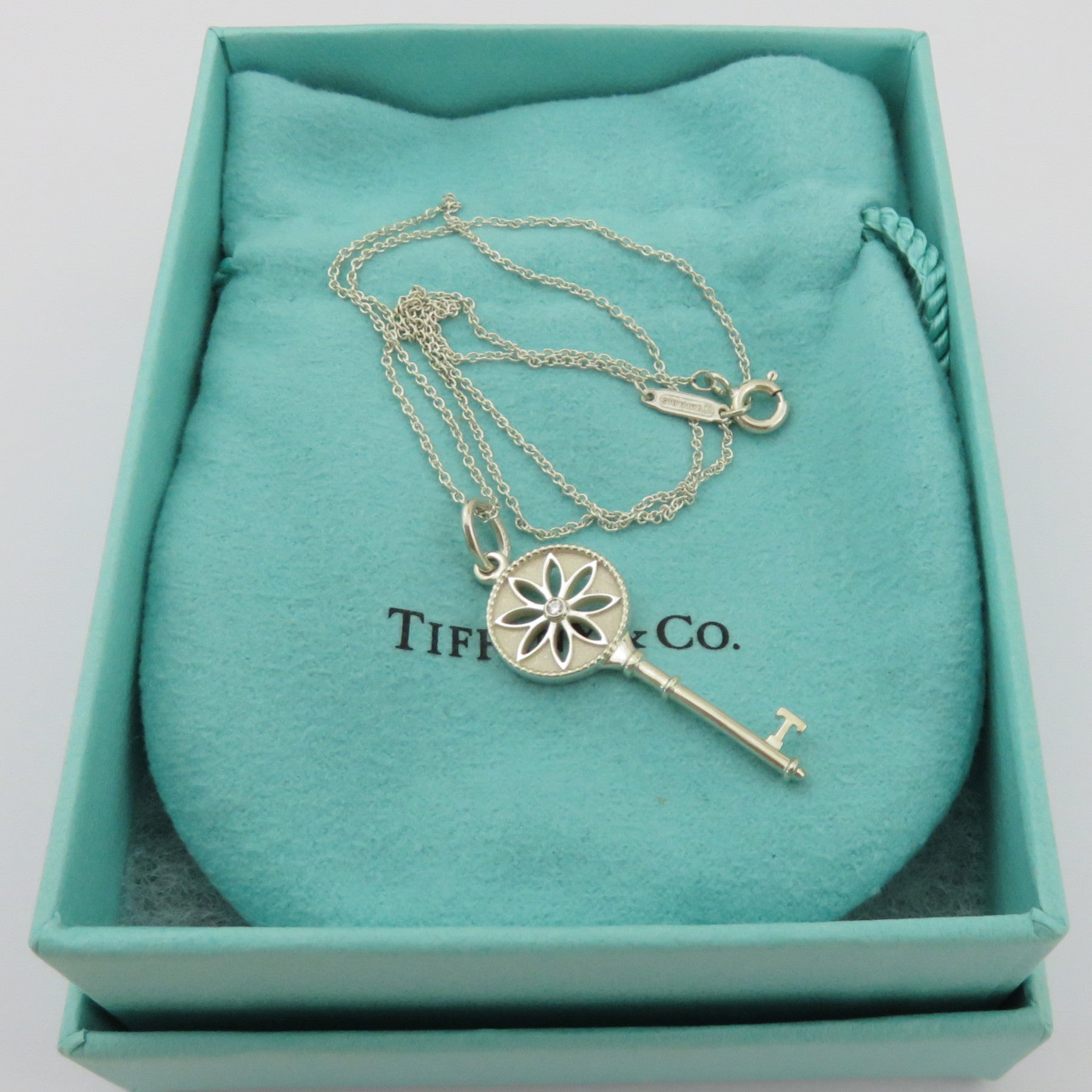 TIFFANY & CO 925 Silver Daisy Flower Key Diamond Necklace with Pouch Box