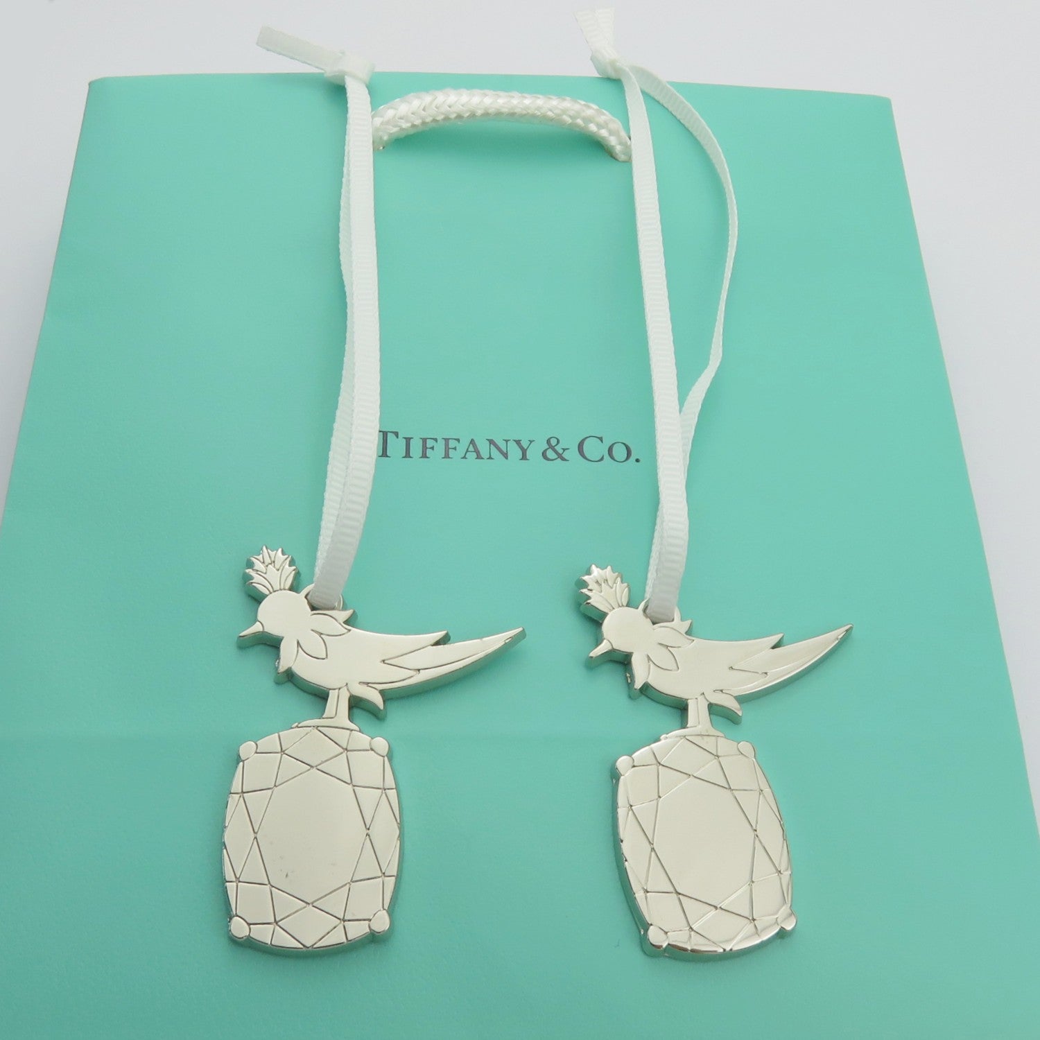 2x Tiffany & Co. Bird on a Rock Charms Polished Silver Tone Metal Set + Bag