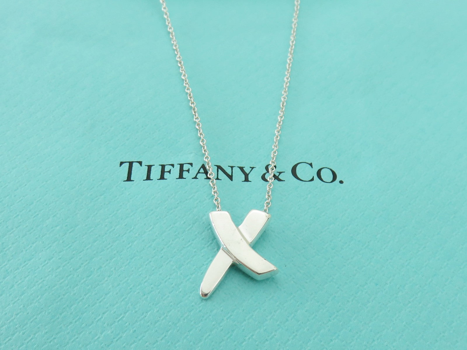 TIFFANY & CO Sterling Silver Kiss X Pendant Necklace Price Includes US Tariff