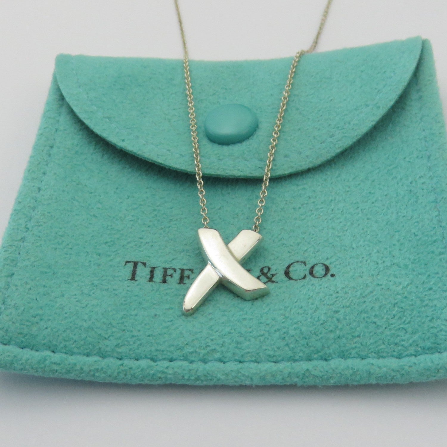 TIFFANY & CO 925 Sterling Silver Kiss X Pendant Necklace with Pouch