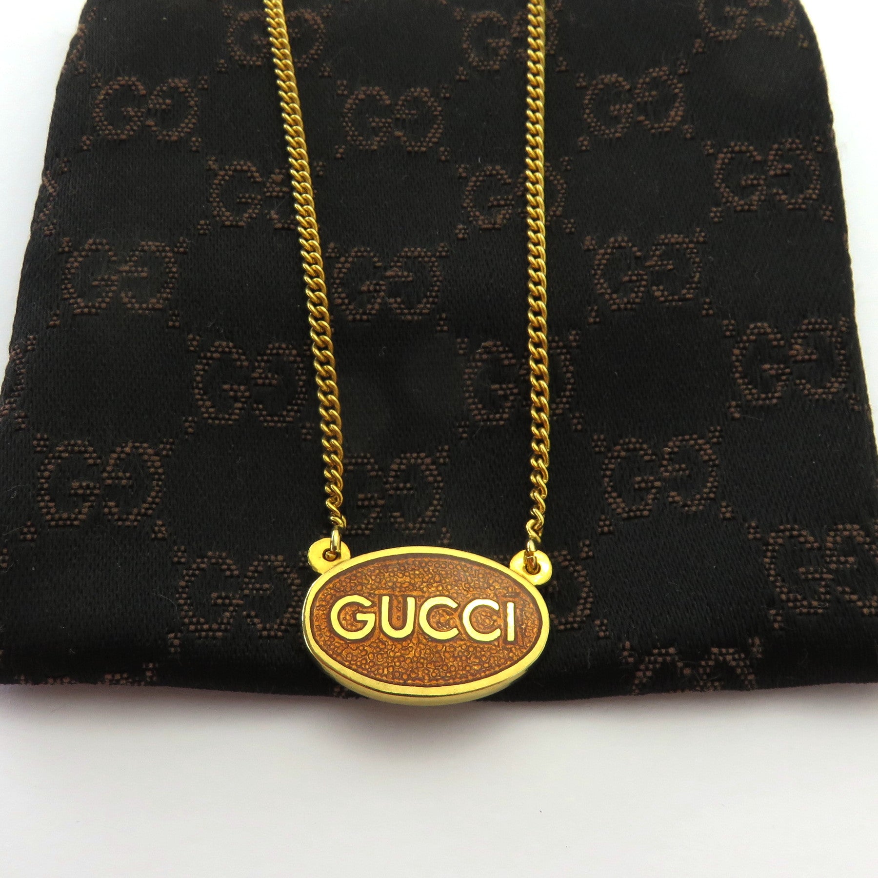Gucci Vintage Gold Tone Metal Oval Tag Pendant Necklace