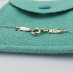 TIFFANY & CO 925 Sterling Silver Infinity Cross Pendant Necklace 