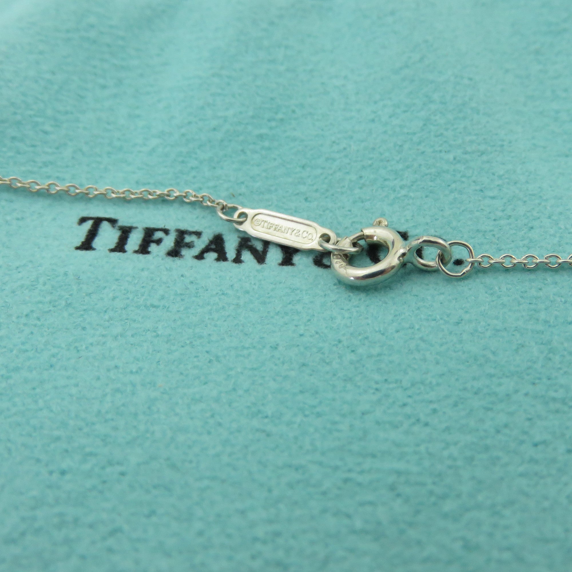 TIFFANY & CO 925 Sterling Silver T & CO Dangle Pendant Necklace with Pouch